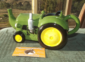 green tractor tea pot